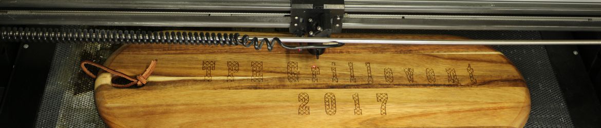 Lasergravur einer Grillplatte aus Olivenholz